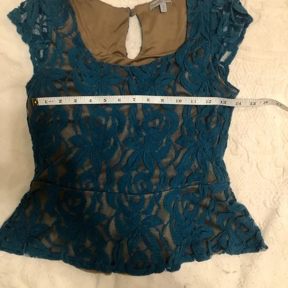 Elegant Charlotte Russe top tagged as medium fits like a small size 4. - Picture 4 of 5